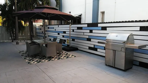 a kitchen with a stove and cabinets