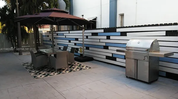a table and chairs in the patio