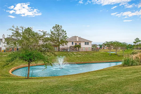 a view of a swimming pool with an outdoor space