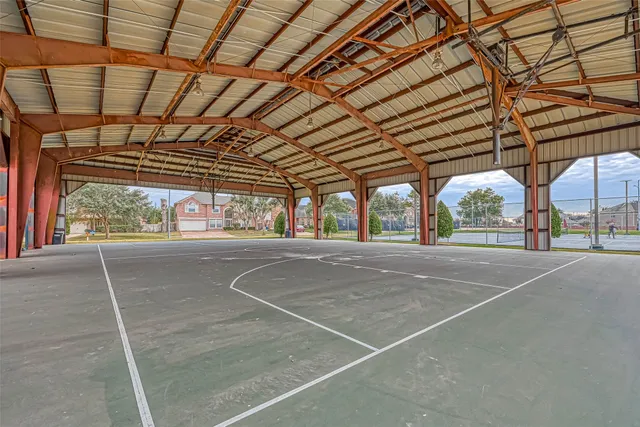 a view of building with outdoor space and river