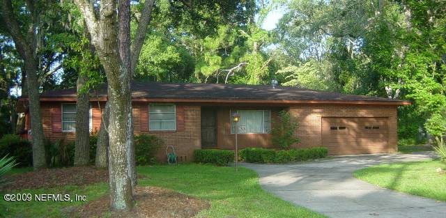 8820 Sanchez Road Jacksonville, FL 32217 - Photo 1 of 12 front view of house with a yard