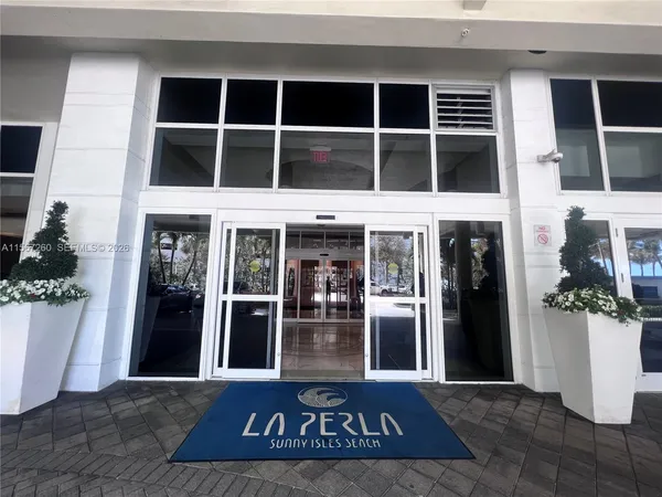 a view of a entryway door with balcony