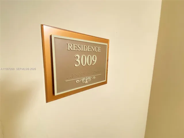 a sign on the wall of a building