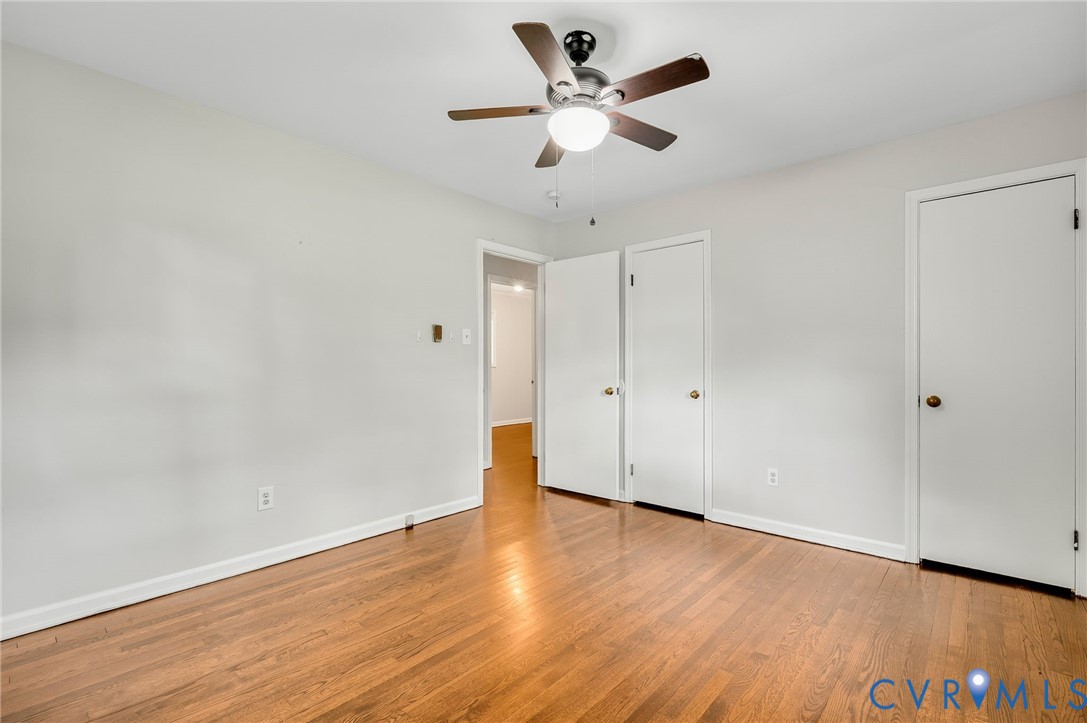 5322 Germain Road Richmond, VA 23224 - Photo 15 of 23 Wood-finish flooring, two white doors, white walls