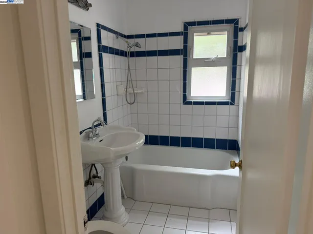 a bathroom with a sink and a bathtub