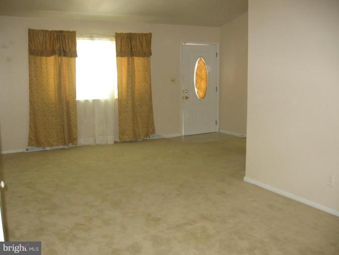 9811 Plowline Road Randallstown, MD 21133 - Photo 8 of 23 Living Room/Dining Room