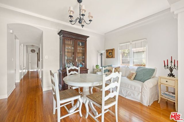 a kitchen with stainless steel appliances a refrigerator sink and cabinets
