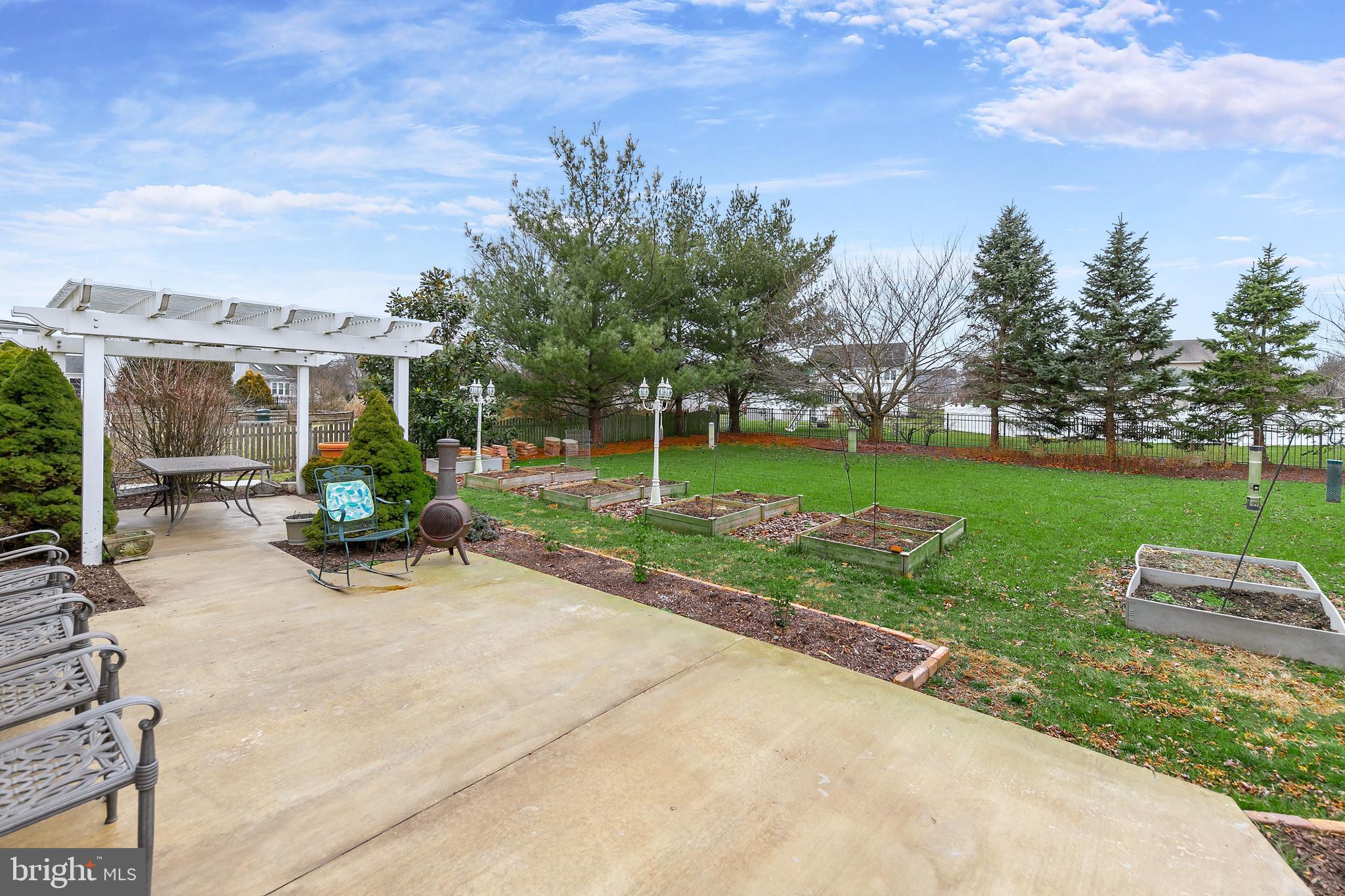 21 Stone Ridge Drive Mickleton, NJ 08056 - Photo 6 of 30 Rear Patio with Vinyl Pergola