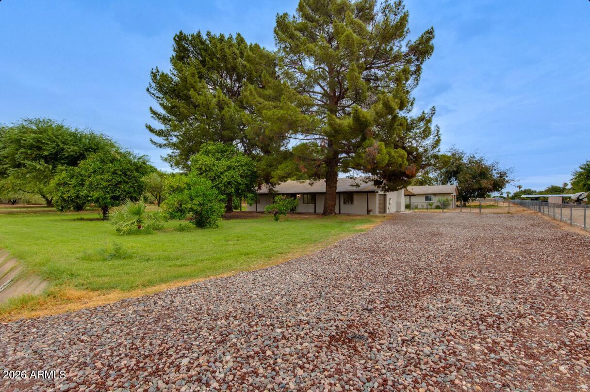 7101 North Perryville Road Waddell, AZ 85355 - Photo 64 of 66 7101 N Perryville driveway