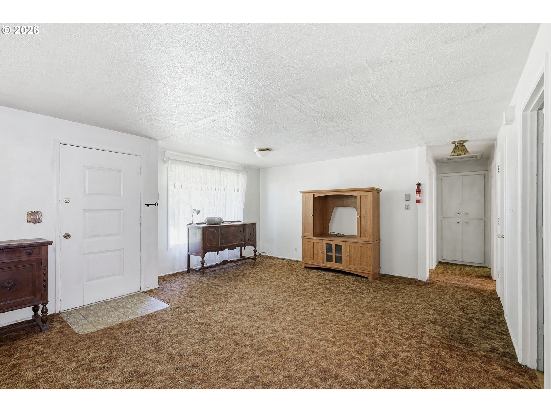 49782 Huckleberry Road Oakridge, OR 97463 - Photo 11 of 21 a view of a room with closet and cabinet