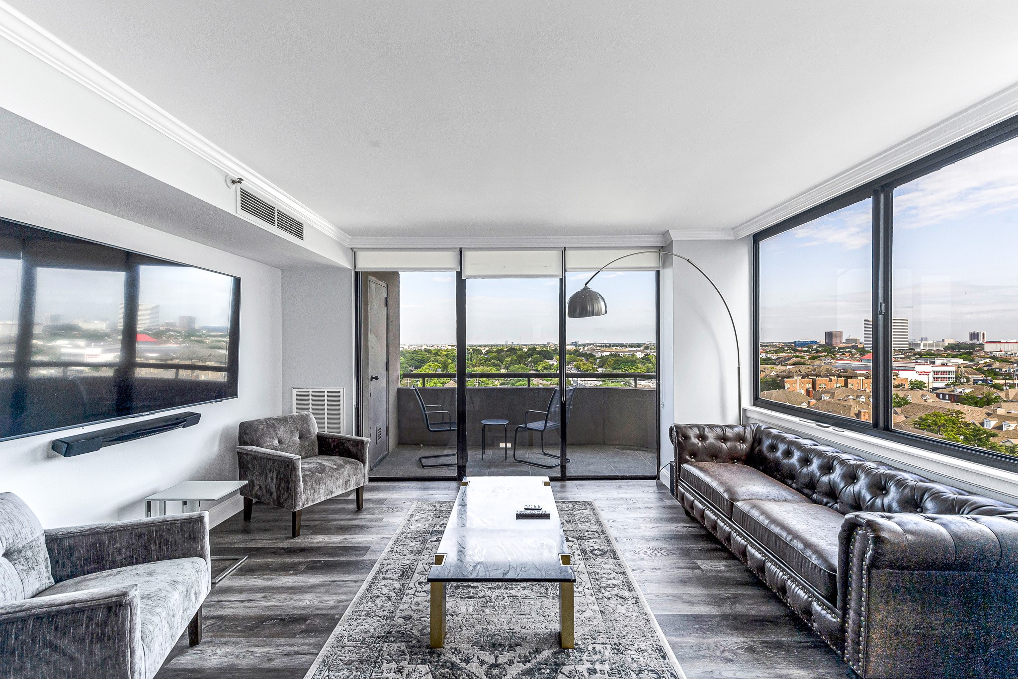 3525 Sage Road, Unit 1115 Houston, TX 77056 - Photo 3 of 47 Living room with stunning views of the city