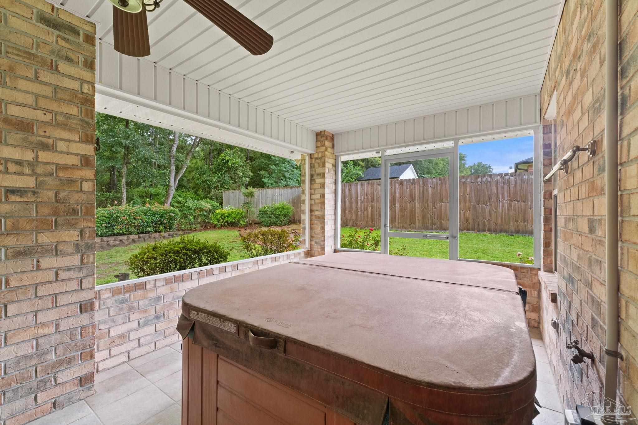 5073 Brookside Drive Pace, FL 32571 - Photo 31 of 38 a view of a backyard with wooden fence