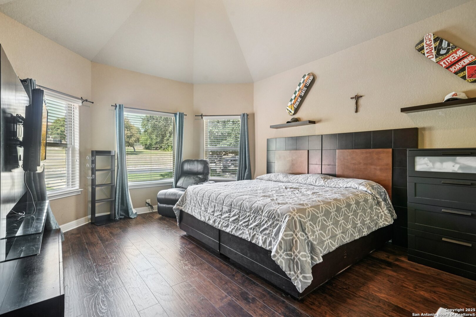 718 Ruidosa Downs Helotes, TX 78023 - Photo 26 of 50 a bed sitting in a spacious bedroom next to a window