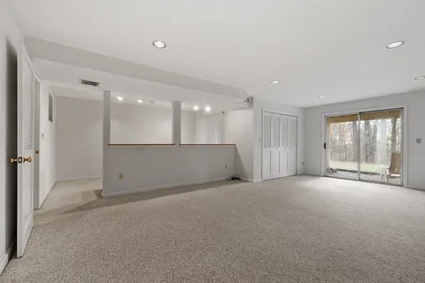 a view of empty room with windows