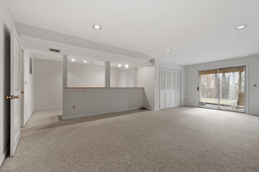 28 Monadnock Drive, Unit 28 Westford, MA 01886 - Photo 24 of 31 a view of an empty room with a window