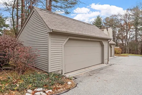 a view of a backyard with trampoline