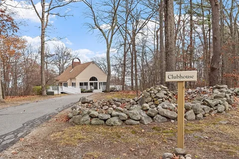 a view of a backyard with entertaining space