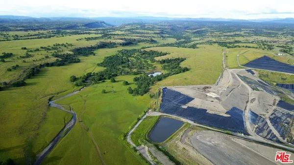 a view of a city with an ocean