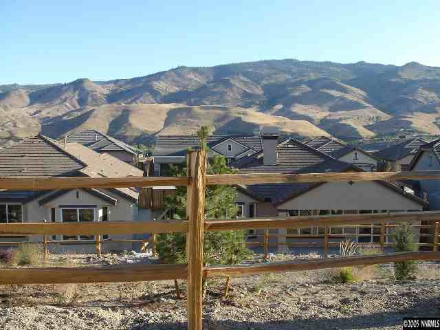 1145 Cliff Park Way Reno, NV 89523 - Photo 3 of 9 a view of a big yard next to a building