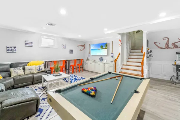 a bedroom with a bed and a mirror