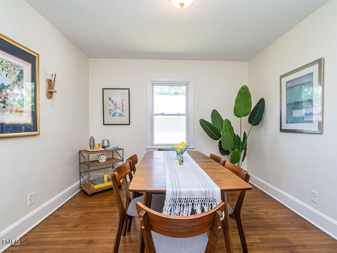 1112 Horton Road Durham, NC 27704 - Photo 8 of 30 a dining room with furniture and wooden floor
