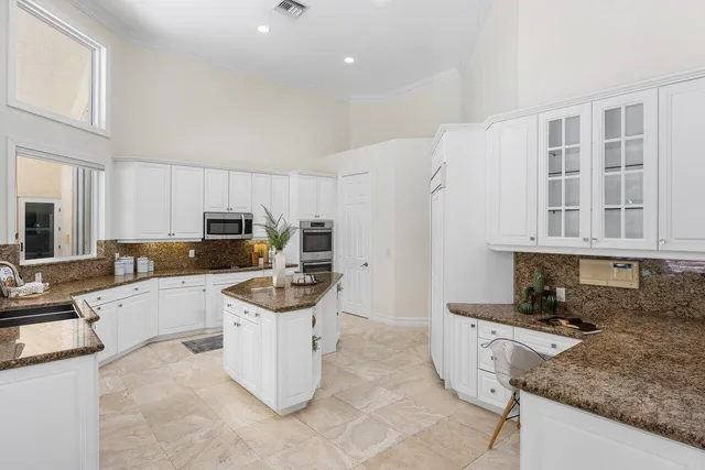a kitchen with a sink and counter top space