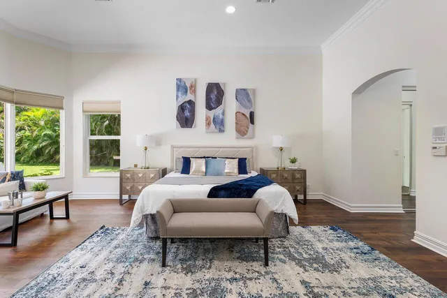 a living room with furniture and a rug