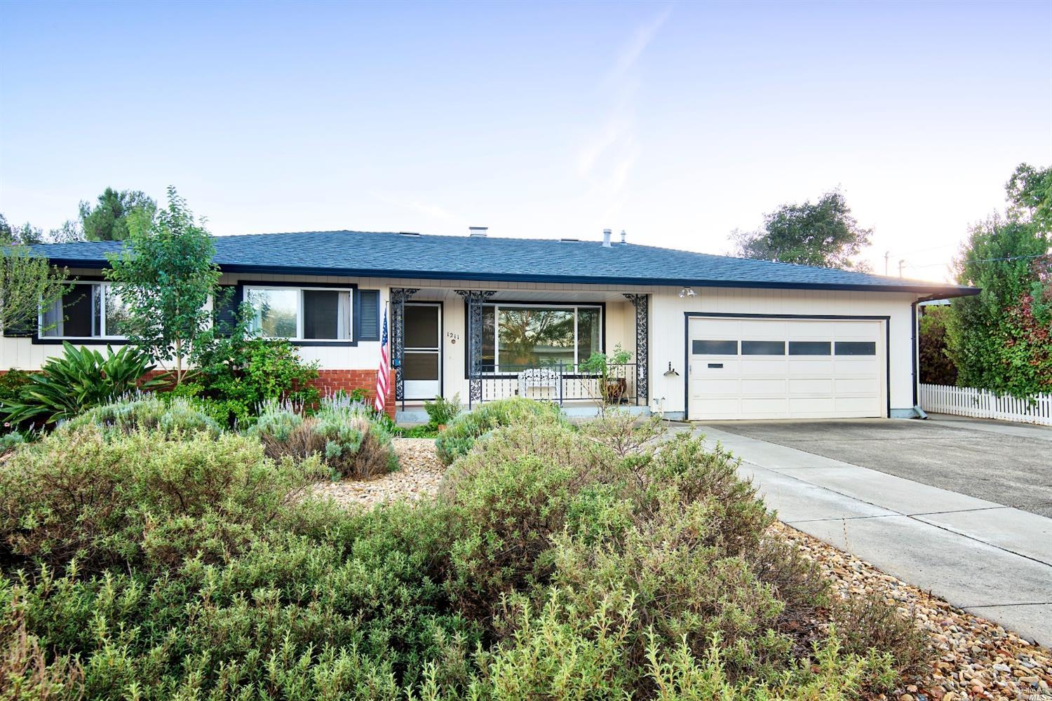 1211 Ridgeview Heights Novato, CA 94947 - Photo 1 of 1 front view of a house with a yard