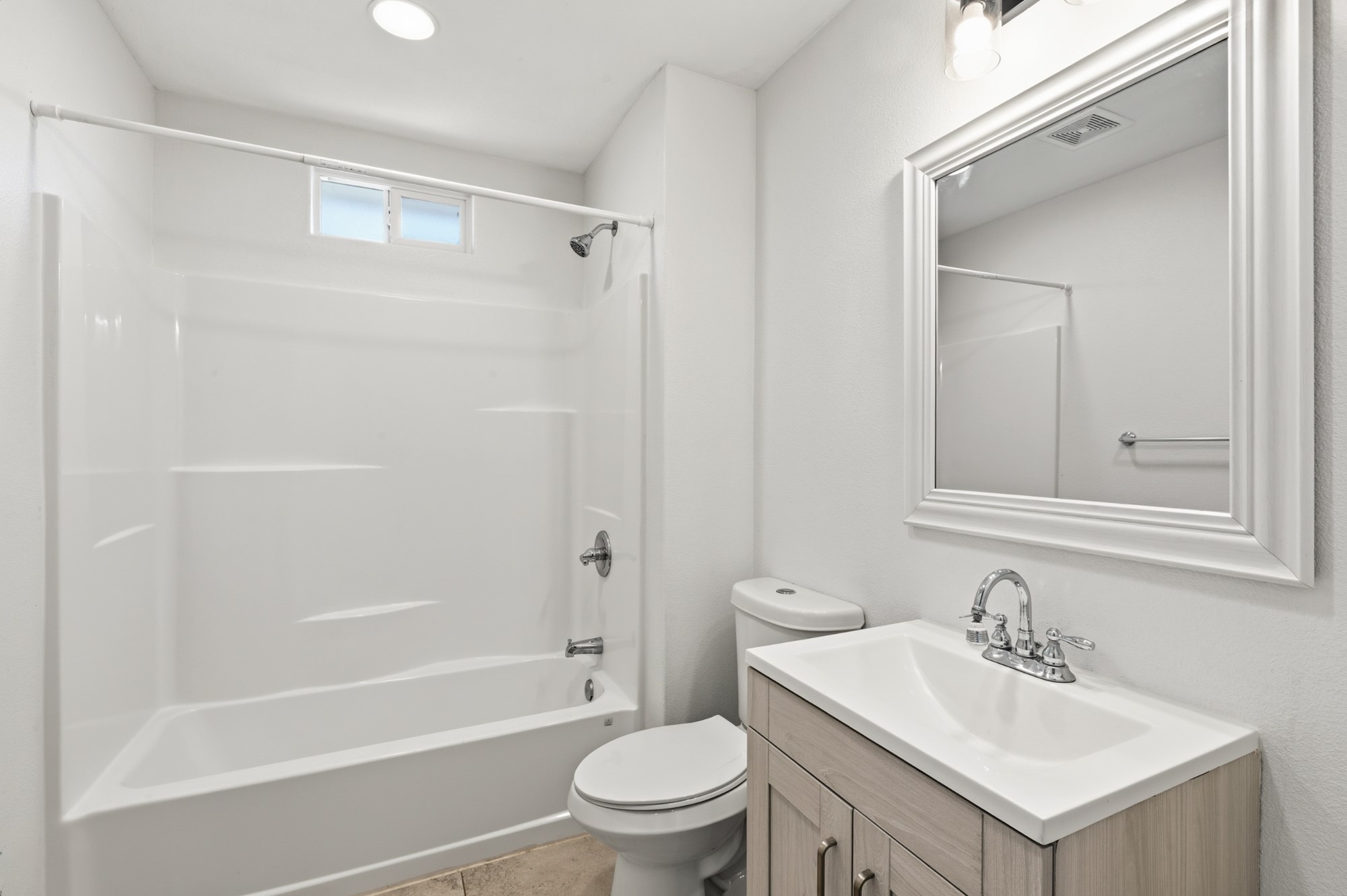 108 Irene Street Elgin, TX 78621 - Photo 18 of 29 Full bathroom featuring vanity and shower combination