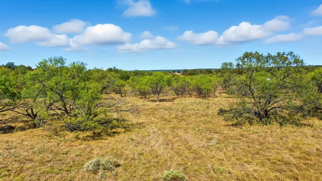 a view of lake with green space