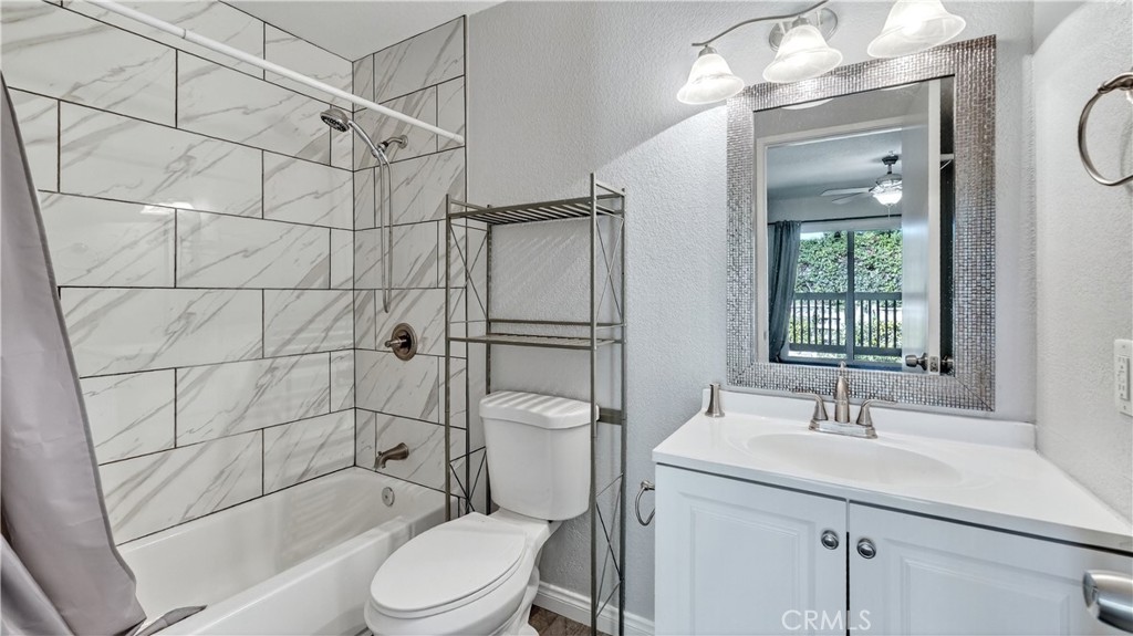 103 South Cross Creek Road, Unit B Orange, CA 92869 - Photo 12 of 29 a bathroom with a sink toilet and shower
