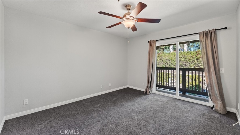 103 South Cross Creek Road, Unit B Orange, CA 92869 - Photo 14 of 29 an empty room with a fan