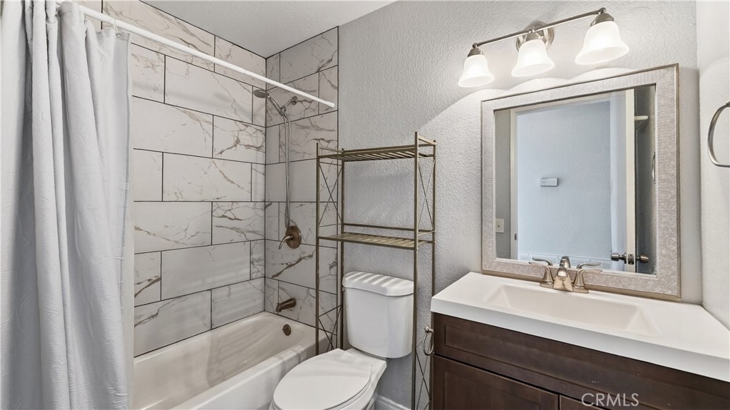 103 South Cross Creek Road, Unit B Orange, CA 92869 - Photo 16 of 29 a bathroom with a sink toilet and shower