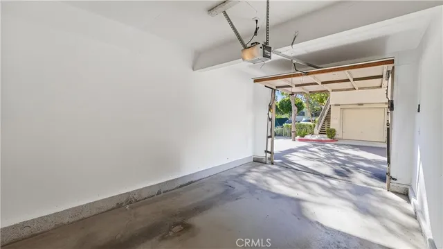 a view of empty room with floor to ceiling window