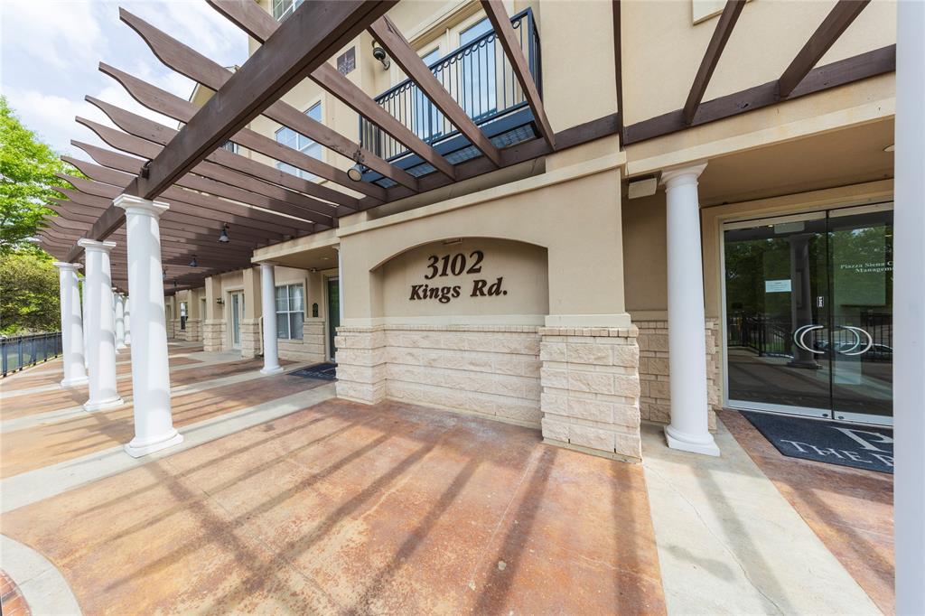 3102 Kings Road, Unit 3310 Dallas, TX 75219 - Photo 17 of 19 a view of a hallway with wooden floor