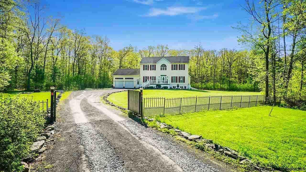a view of a swimming pool with a garden