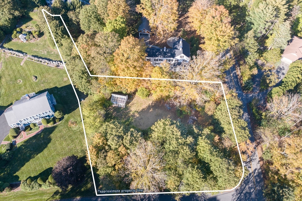 3 October Lane Weston, MA 02493 - Photo 1 of 32 an aerial view of residential houses with outdoor space