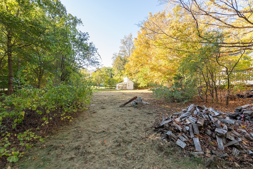 3 October Lane Weston, MA 02493 - Photo 17 of 32 a view of an outdoor space and a yard
