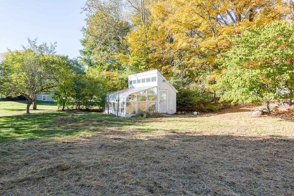 3 October Lane Weston, MA 02493 - Photo 19 of 32 a view of a house with a yard