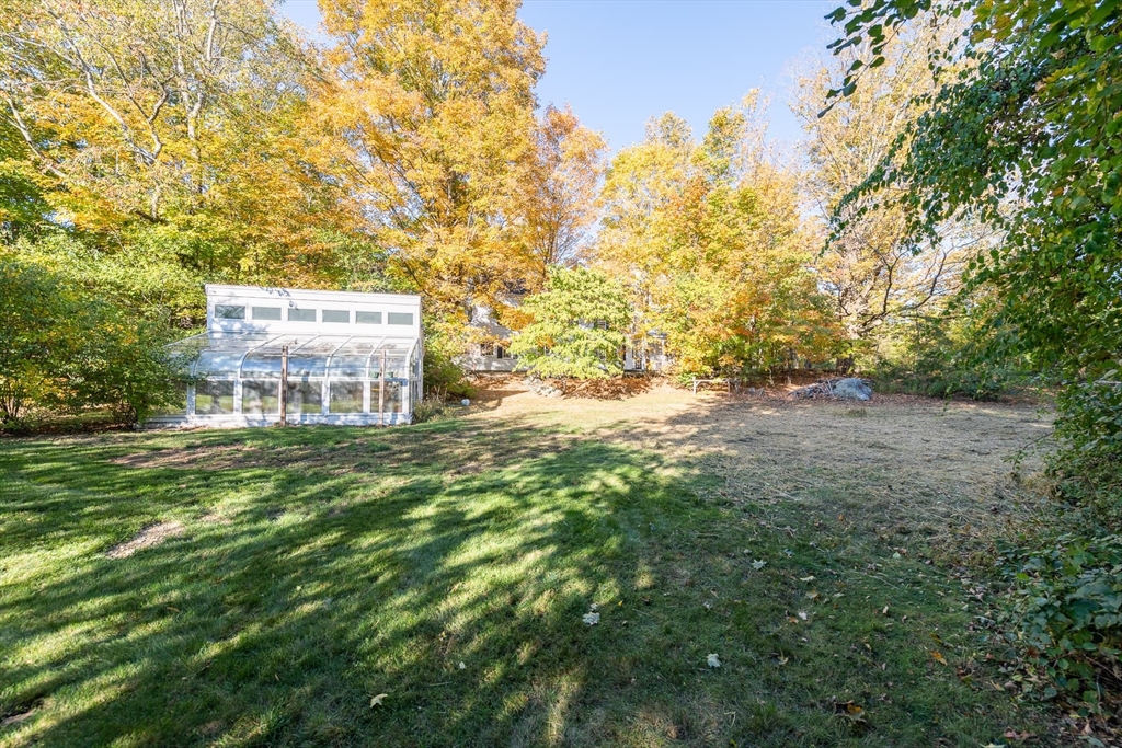 3 October Lane Weston, MA 02493 - Photo 21 of 32 a view of a big yard with large trees
