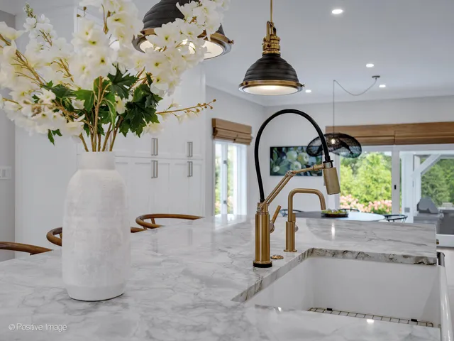 a view of a kitchen with a refrigerator cabinets and a window