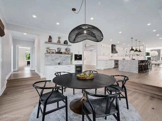 a living room with furniture window and wooden floor