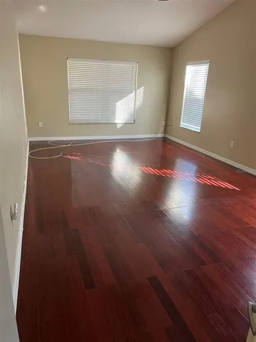 a bathroom with a tub a sink a mirror and a shower