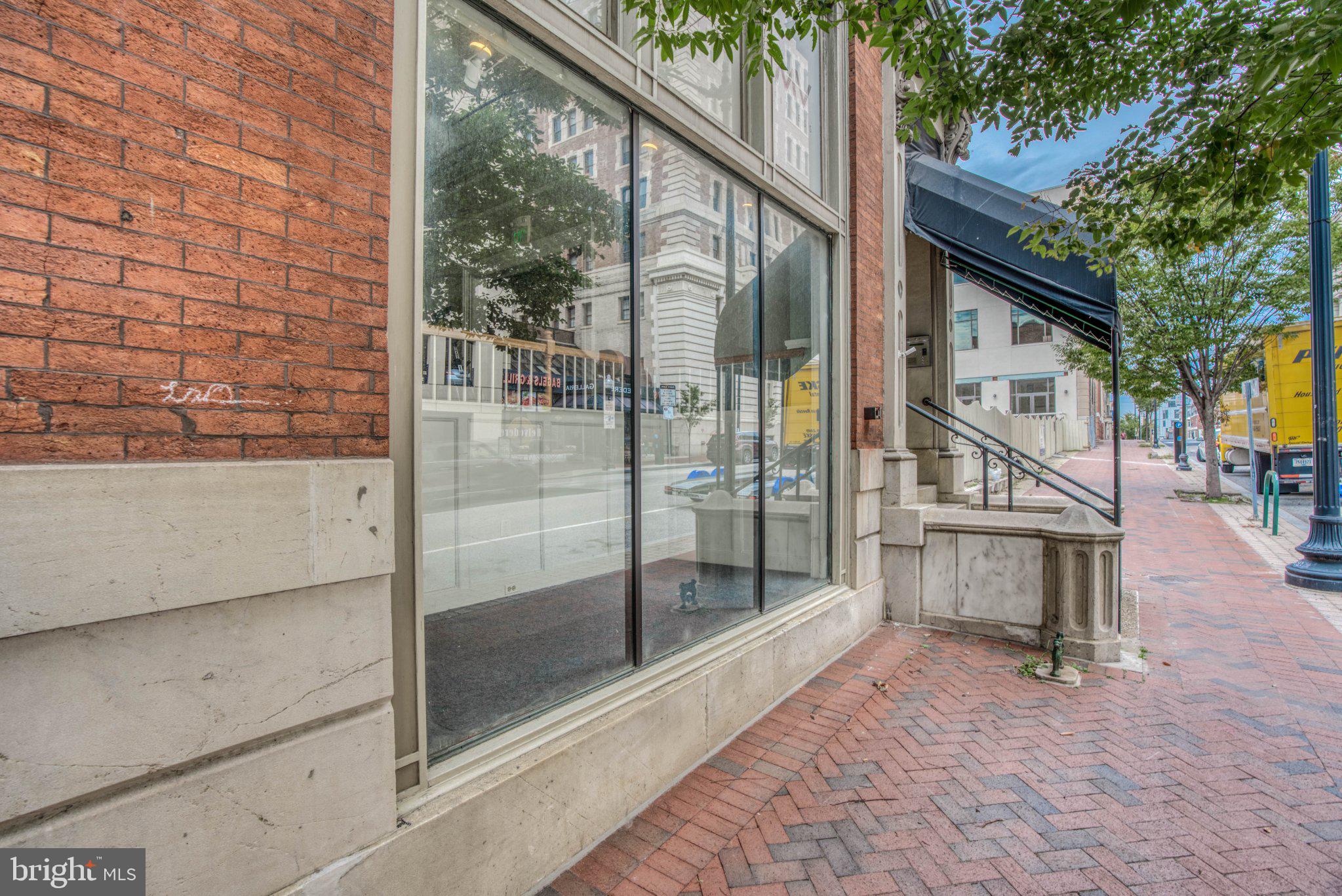 1018 North Charles Street, Unit R Baltimore, MD 21201 - Photo 3 of 17 Charming urban storefront awaits vision.
