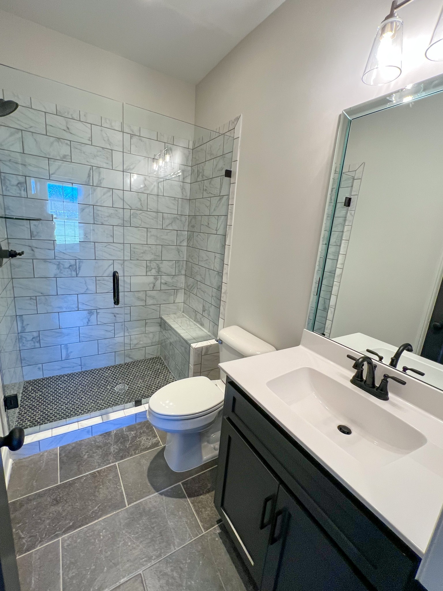 4520 McCrary Road Lebanon, TN 37090 - Photo 17 of 20 a bathroom with a sink a toilet and shower