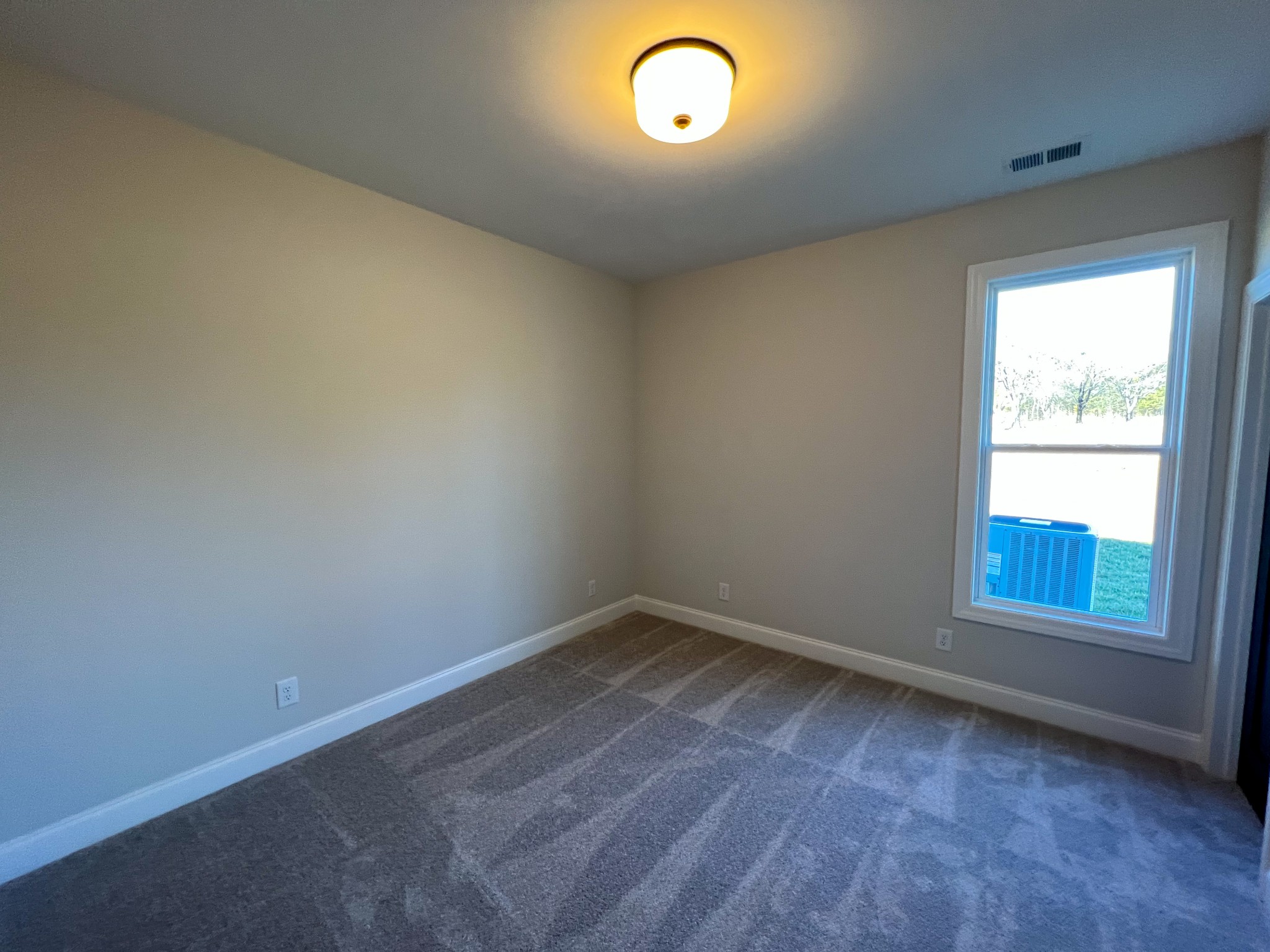4520 McCrary Road Lebanon, TN 37090 - Photo 18 of 20 an empty room with a empty space and a window