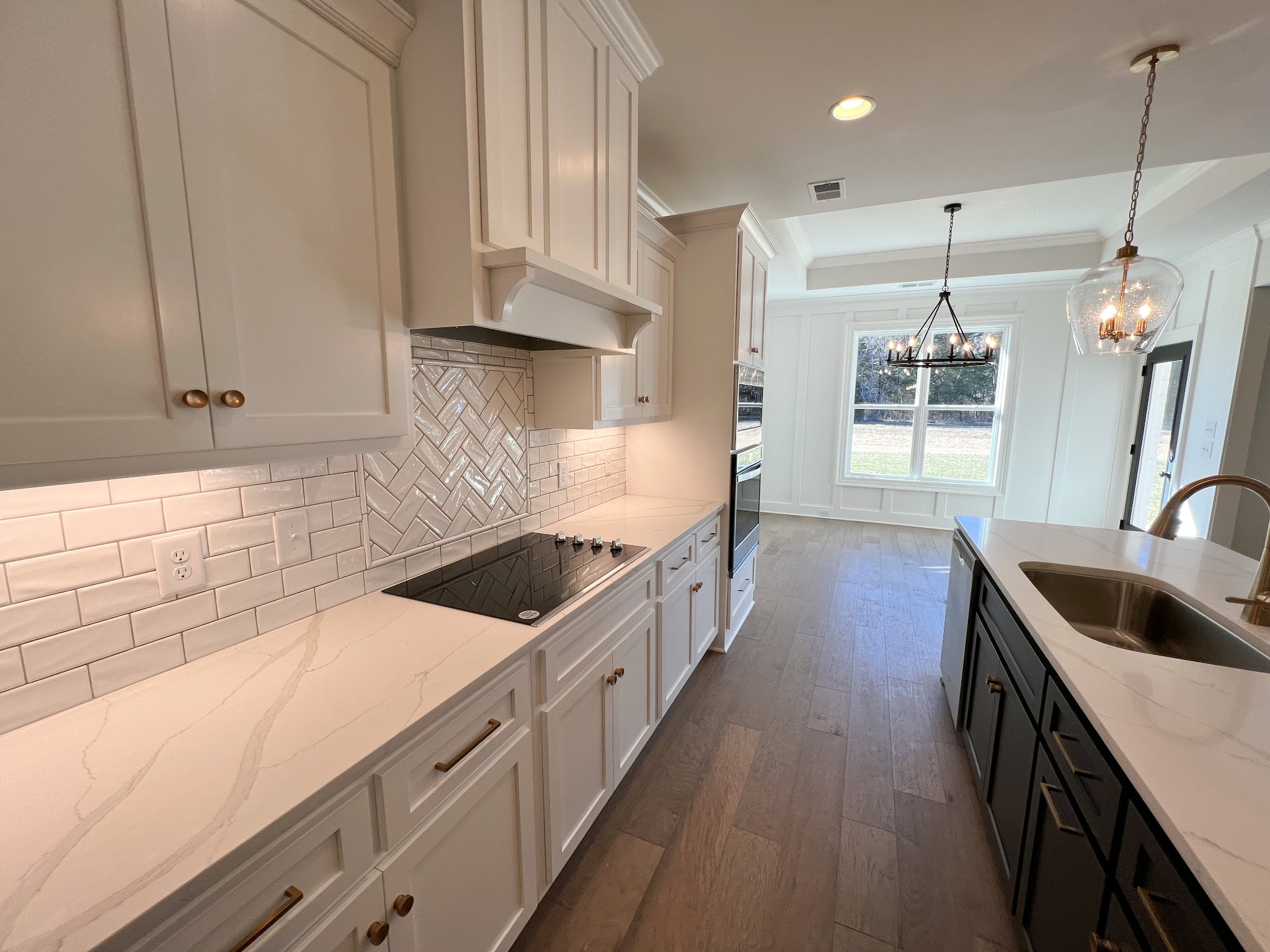 4520 McCrary Road Lebanon, TN 37090 - Photo 9 of 20 a kitchen with kitchen island a sink stove and cabinets
