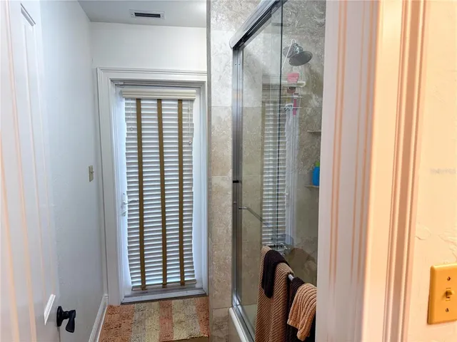 a view of a bathroom from a bathroom