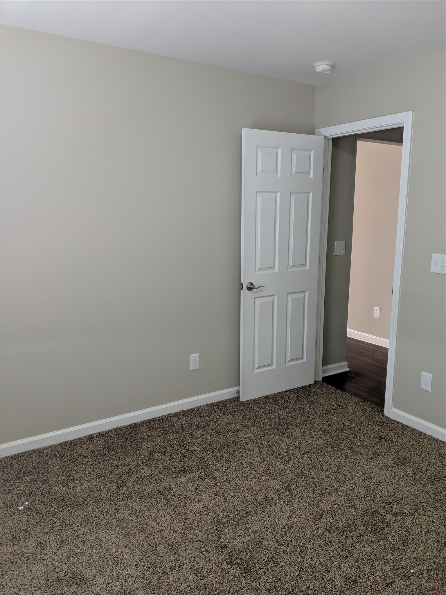 147 A T G T Road Portland, TN 37148 - Photo 11 of 11 a view of an empty room with closet area