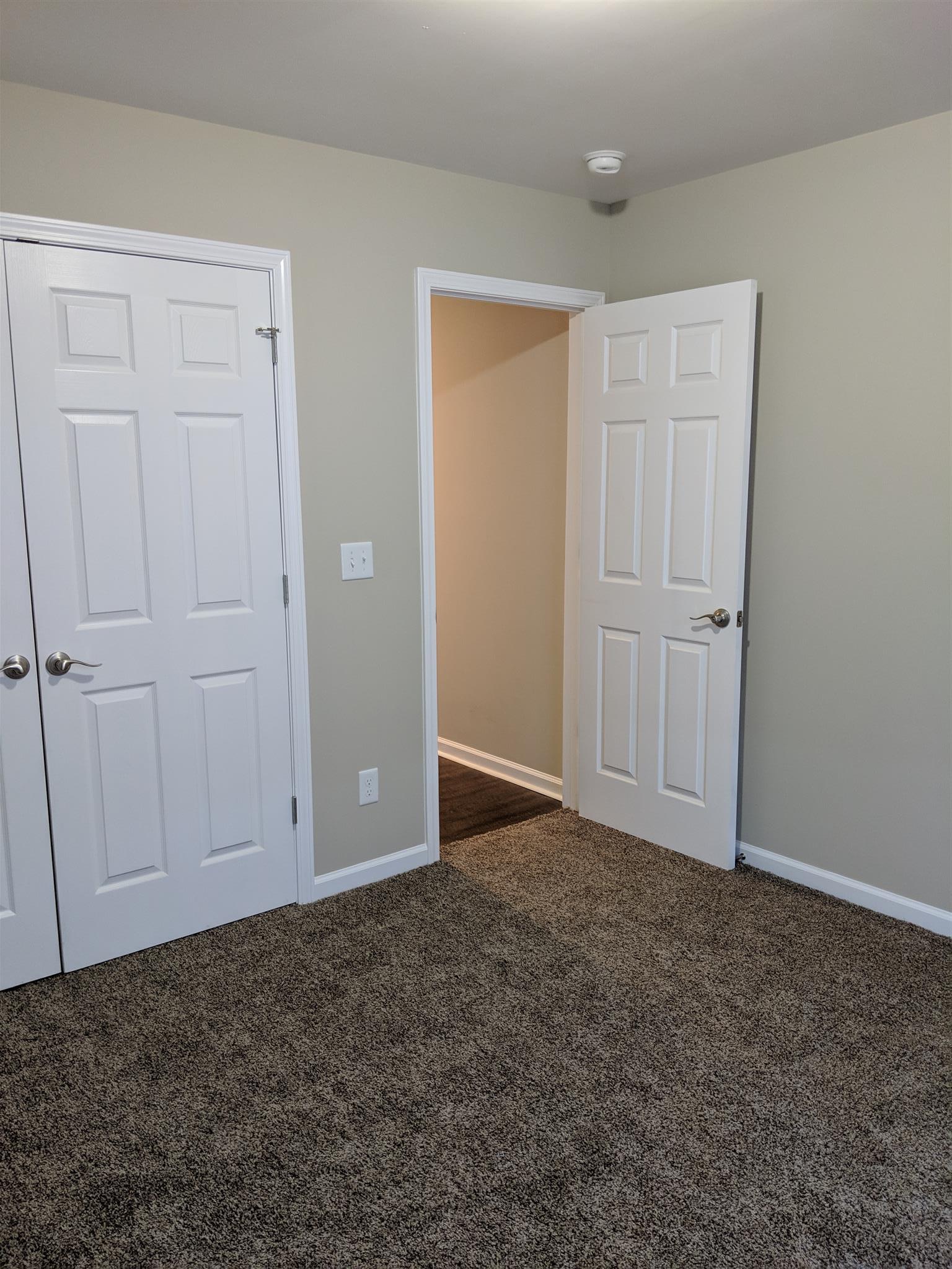 147 A T G T Road Portland, TN 37148 - Photo 10 of 11 an empty room with closet area